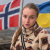 Катерина Станиславская на фоне флагов Норвегии и Украины